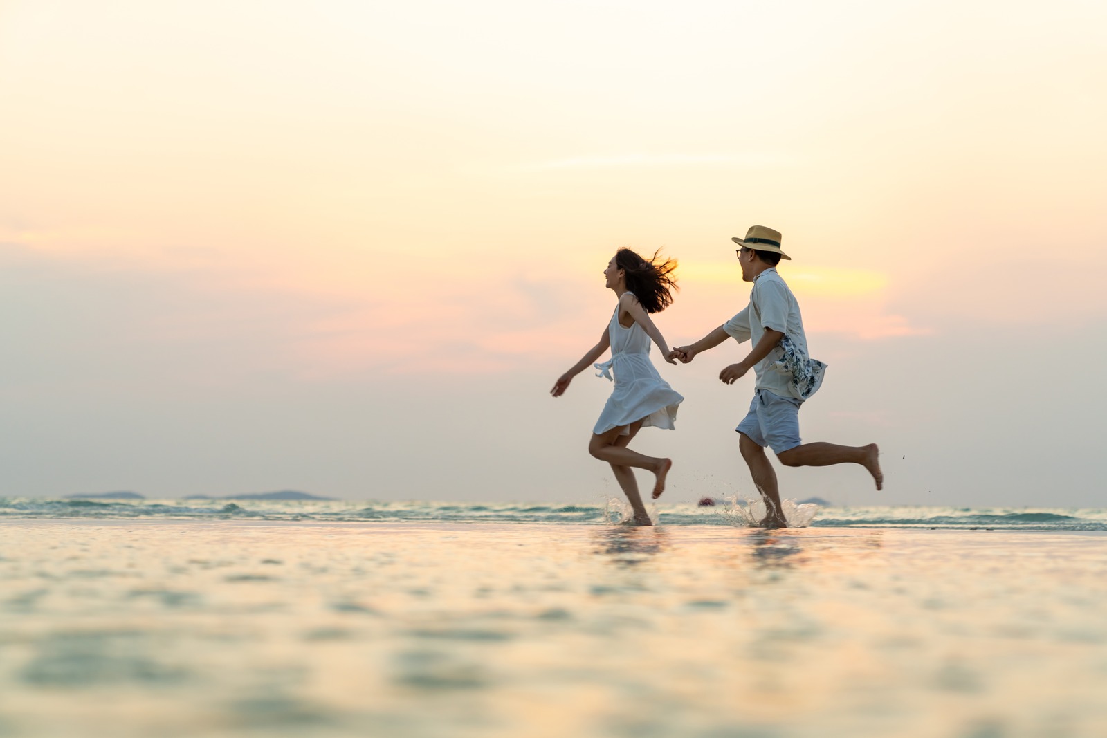 A couple has fun on a Hua Hin beach
