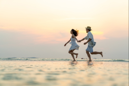 A couple has fun on a Hua Hin beach